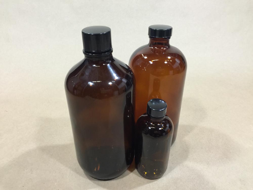 https://www.yankeecontainers.com/c/wp-content/uploads/2014/12/Amber-boston-round-glass-bottles-medicine-bottles.jpg